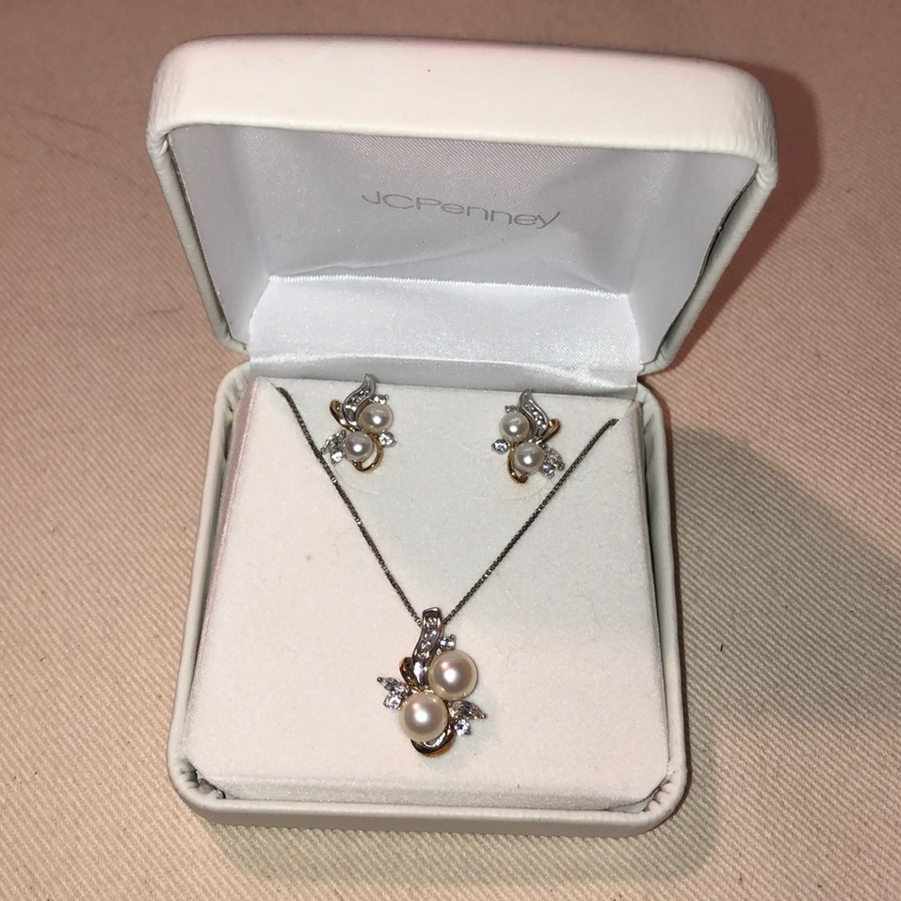 Diamond and pearl necklace and earrings set.